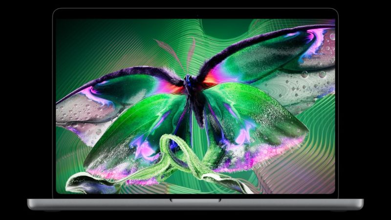 MacBook Pro OLED cảm ứng với màn hình PROLED XDR hiển thị hình bướm